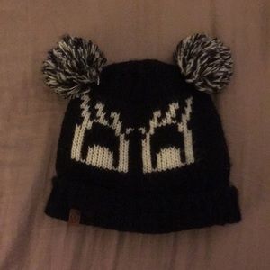 Beanie with pigtail puffballs